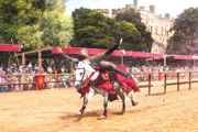 Warwick Castle crowd watching knight on horse